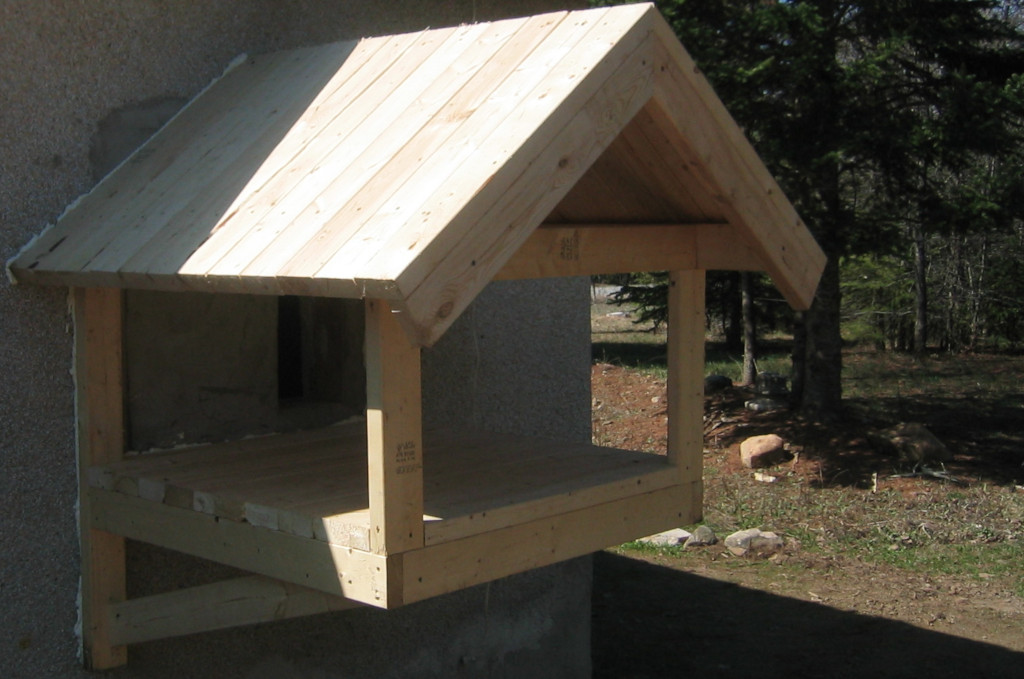 cat pen on outside wall